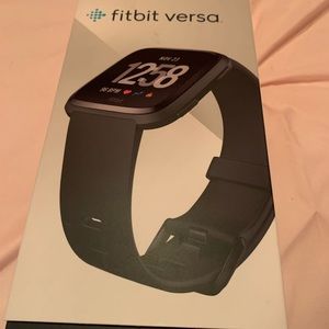 Brand new Fitbit Versa never used